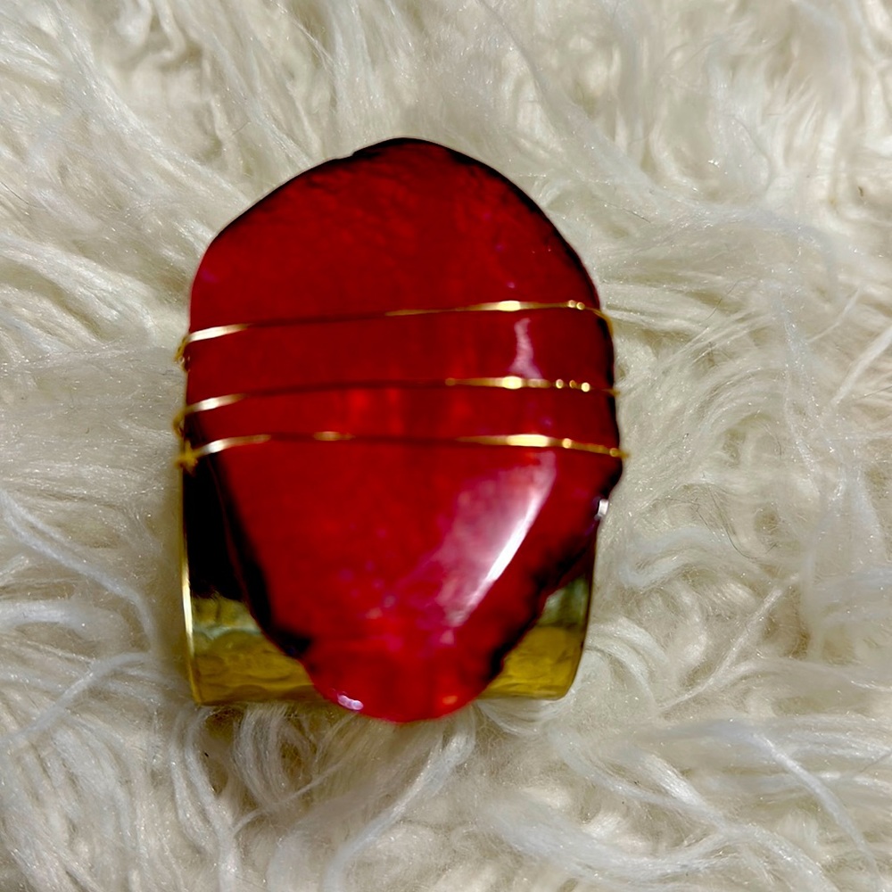 Hand made hammered gold cuff with natural pink stone.